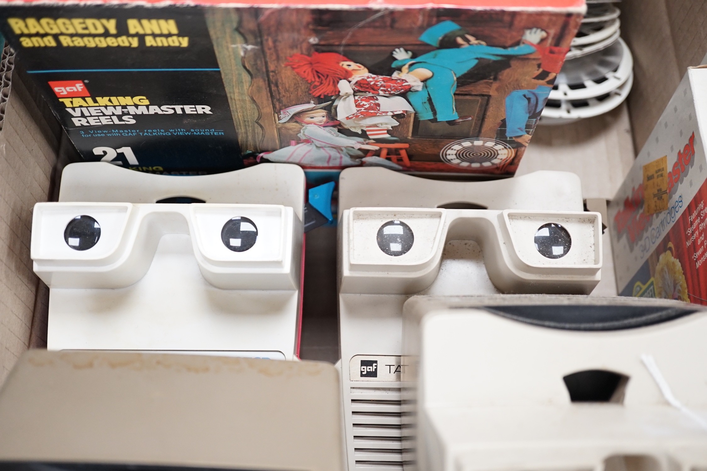 Four Talking View-Master stereo viewers and ten sets of Talking View-Master reels or cartridges and other loose Talking reels